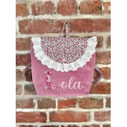 Sac à dos rose fleurs lettre fleurie et froufrou