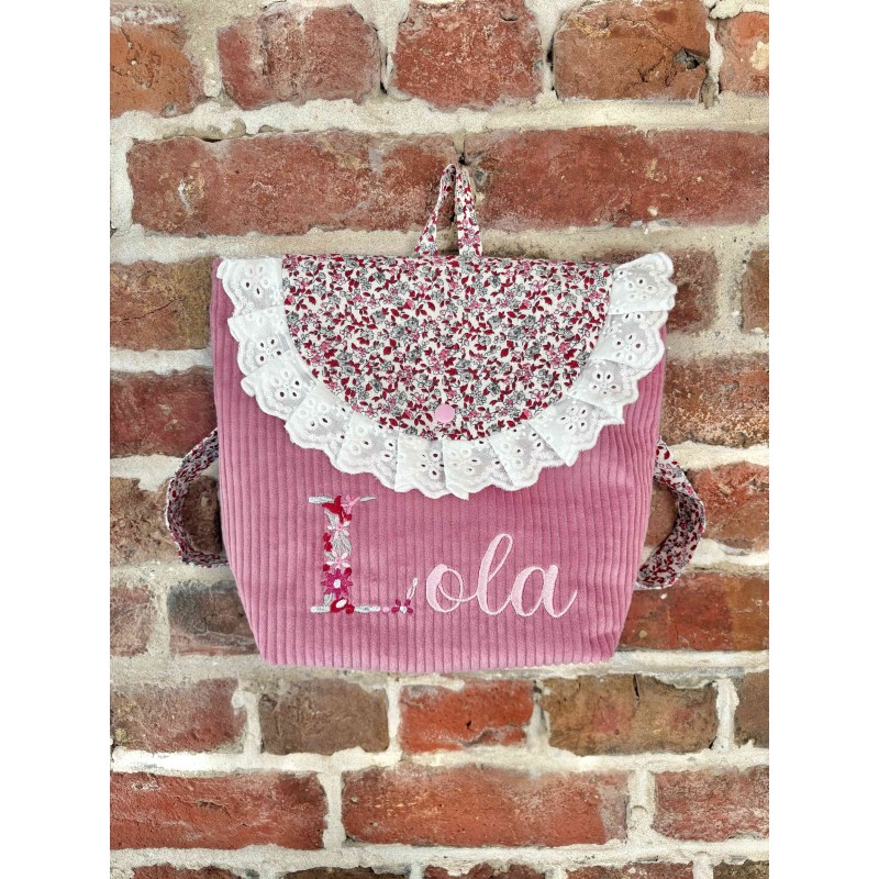 Sac à dos rose fleurs lettre fleurie et froufrou
